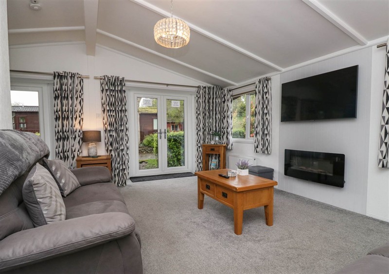 Relax in the living area at Lily Tarn, White Cross Bay near Troutbeck Bridge