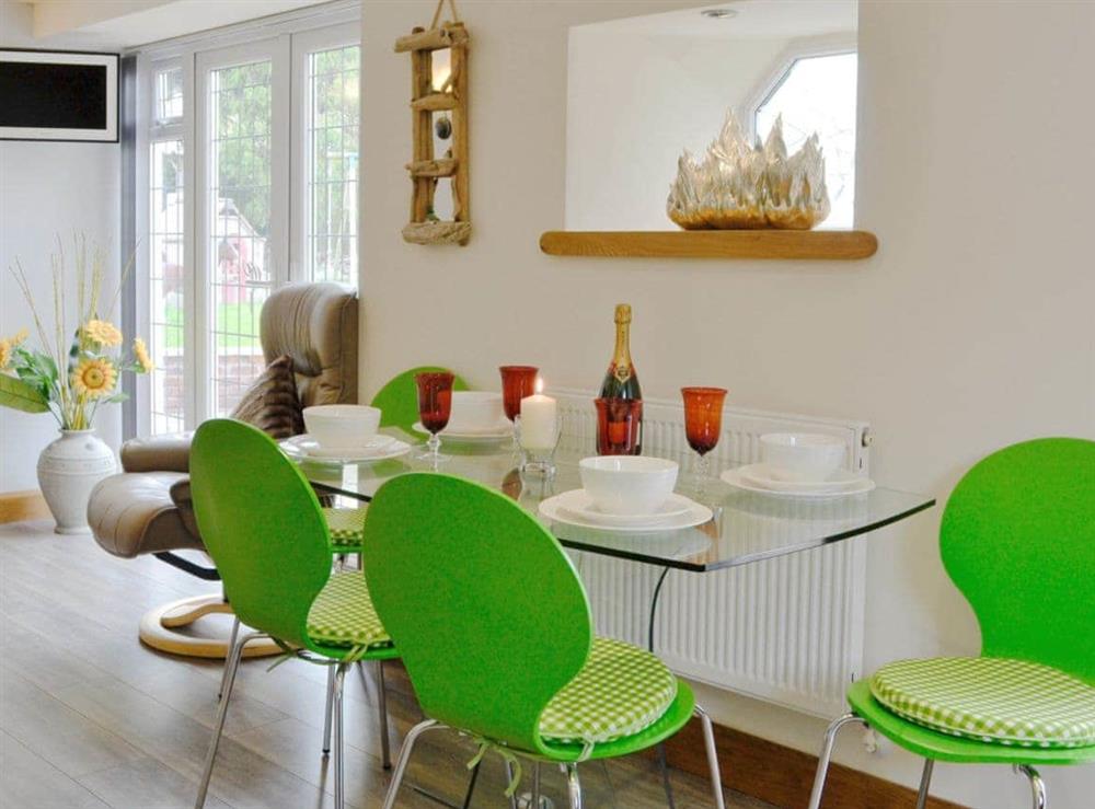 Charming dining area at Lily Vale Cottage in Pontarddulais, near Llanelli, West Glamorgan