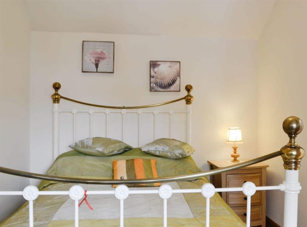 Comfortable double bedroom at Lily Vale Cottage in Pontarddulais, near Llanelli, West Glamorgan