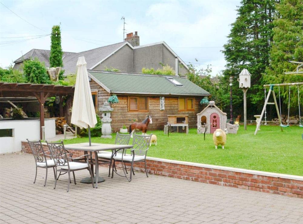Large laend garden & patio area at Lily Vale Cottage in Pontarddulais, near Llanelli, West Glamorgan
