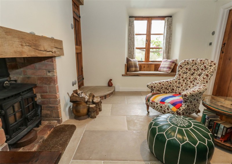 Relax in the living area (photo 4) at Limberlost Cottage, near Hamworthy