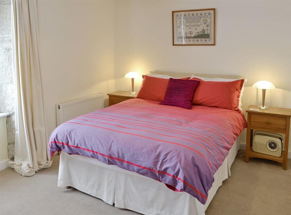 Comfortable double bedroom at Lime Cottage in Portland, near Weymouth, Dorset