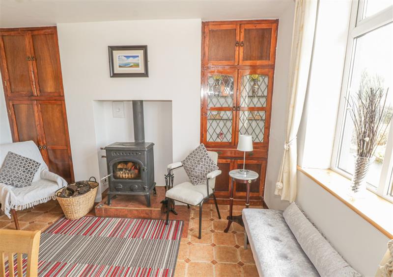 Living room with a wood burning stove at Lime Tree Cottage, Aughaward near Foxford, Mayo