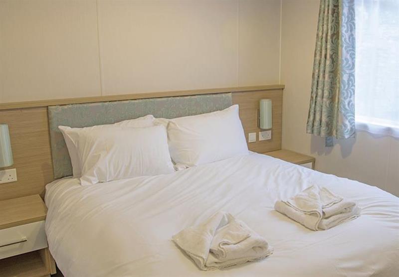 Double bed at Limefitt Platinum 3 Bed Lodge at Limefitt Park in Windermere, Cumbria
