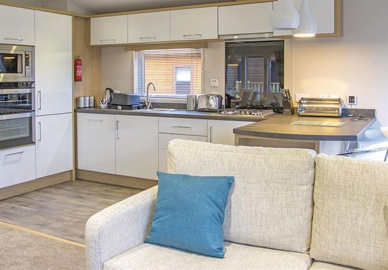 The kitchen in Limefitt Platinum 3 Bed Lodge (photo number 2) at Limefitt Park in Windermere, Cumbria