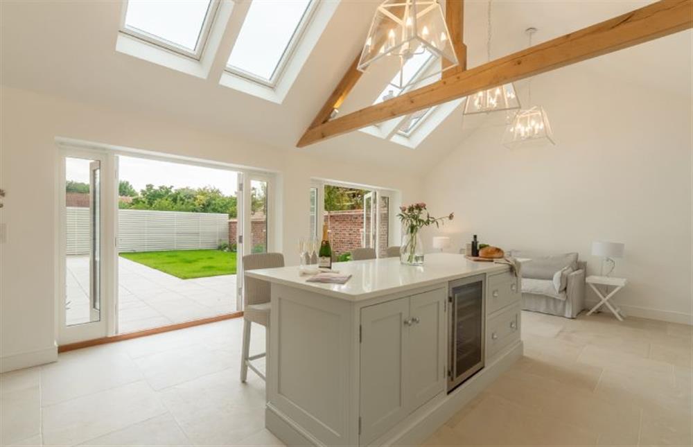 Limestone House, Norfolk: French doors extend the kitchen to the outside  at Limestone House, Burnham Market