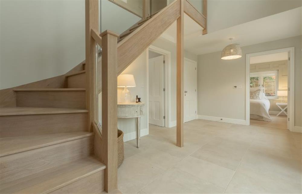 Limestone House, Norfolk: From the front entrance, a stunning oak staircase leads to the first floor