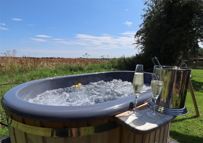 There is a hot tub at Limetree Luxury Glamping Portland, Nottingham