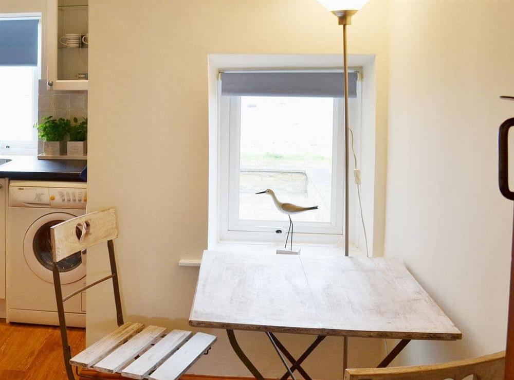 The dining area is placed so as to allow great views whilst you eat at Limpet Cottage in Boulmer, Northumberland