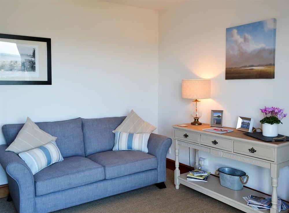 The living room is warm cosy and relaxing (photo 2) at Limpet Cottage in Boulmer, Northumberland