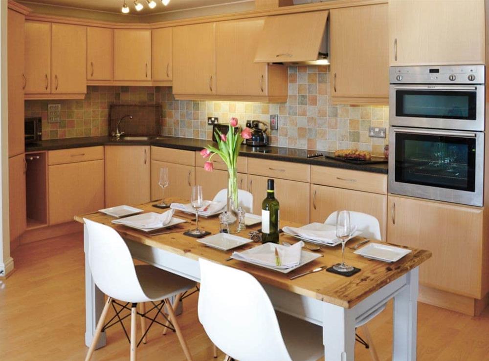 Kitchen/diner at Linhay Apartment in St Austell, Cornwall