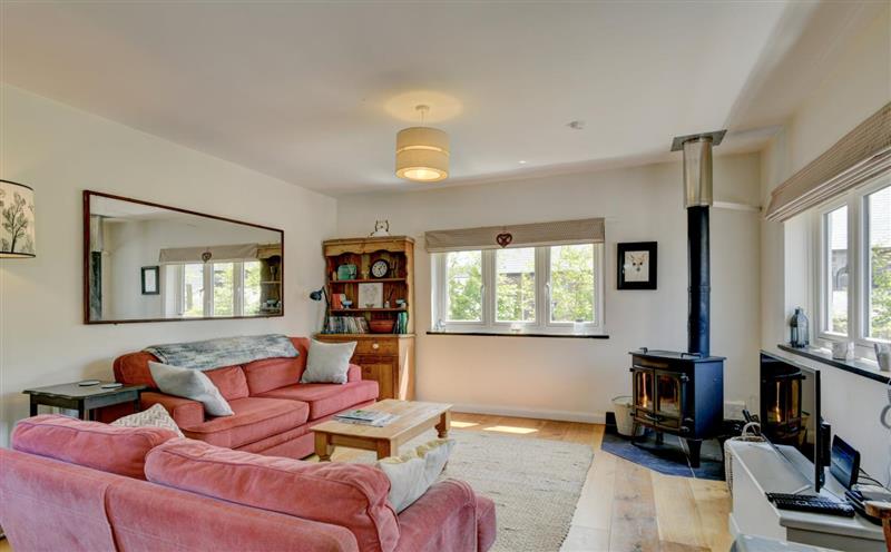 Enjoy the living room at Linhay Cottage, Withypool