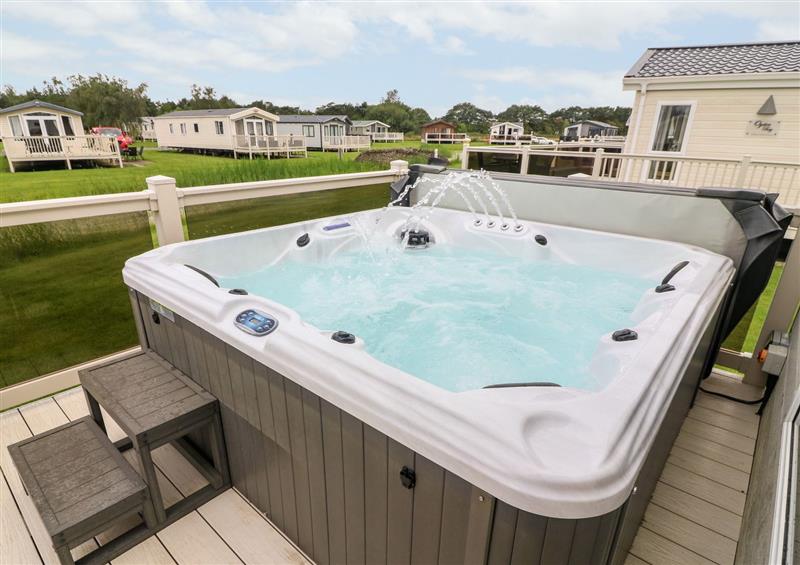 There is a hot tub at Links Lodge, Flookburgh