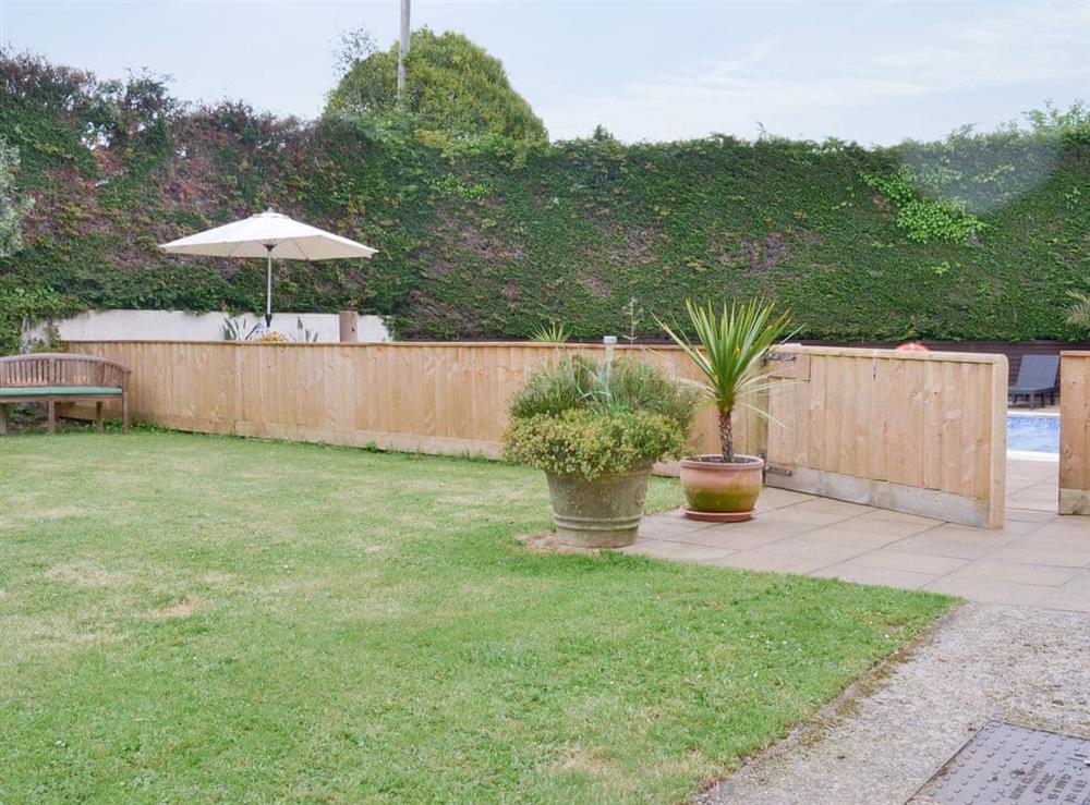 Lawned garden area at Linnets in Fitzhead, nr Wivelscombe, Somerset