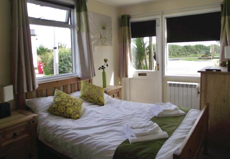 Bedroom in a Seabreeze Bungalow at Liskey Hill Holiday Park in Perranporth, North Cornwall