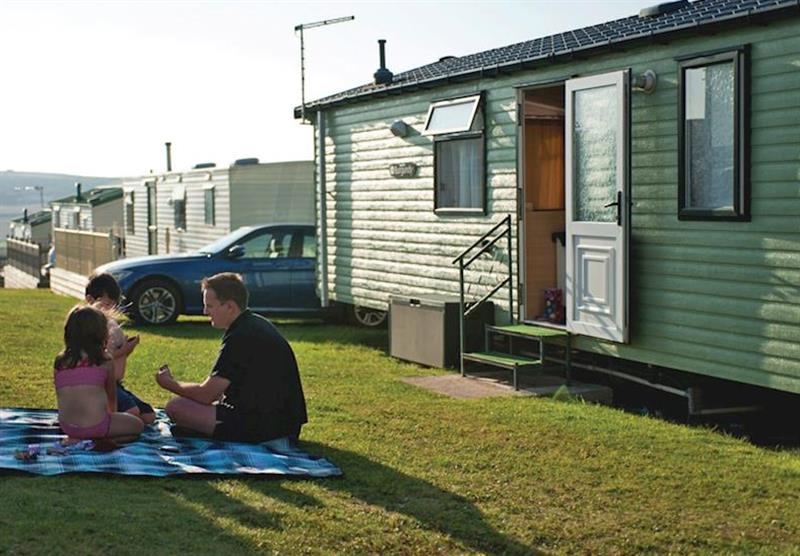 Picnic by the caravans at Liskey Hill Holiday Park in Perranporth, North Cornwall