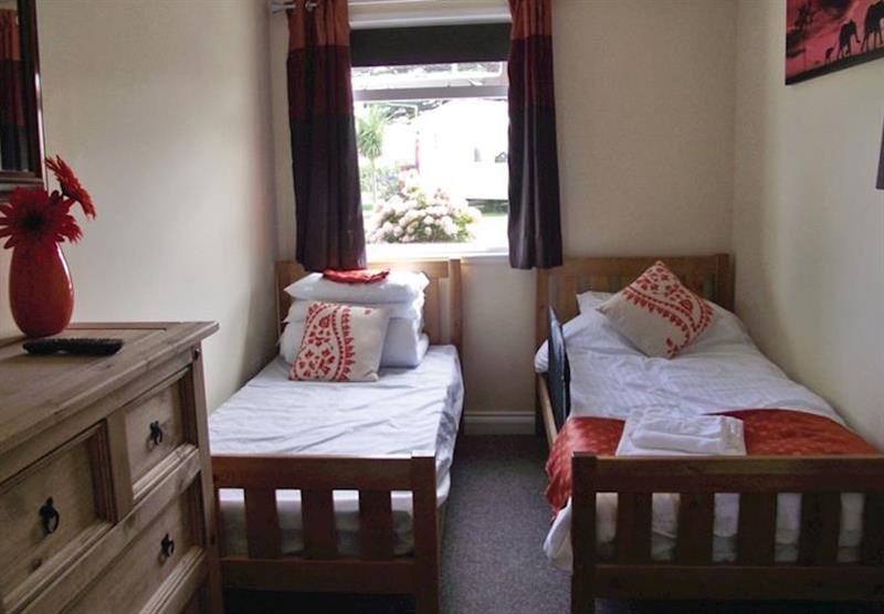 Twin bedroom in the Seabreeze Bungalow at Liskey Hill Holiday Park in Perranporth, North Cornwall