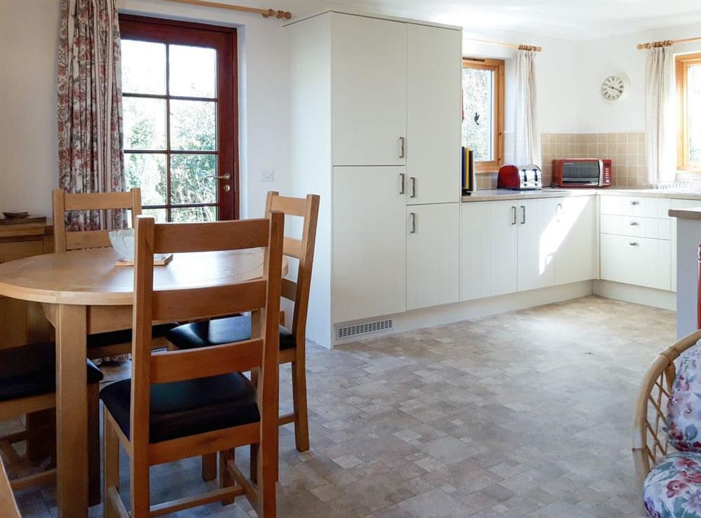 Airy kitchen and dining room at Lismore Cottage in North Ballachulish, near Glencoe, Highlands, Inverness-Shire