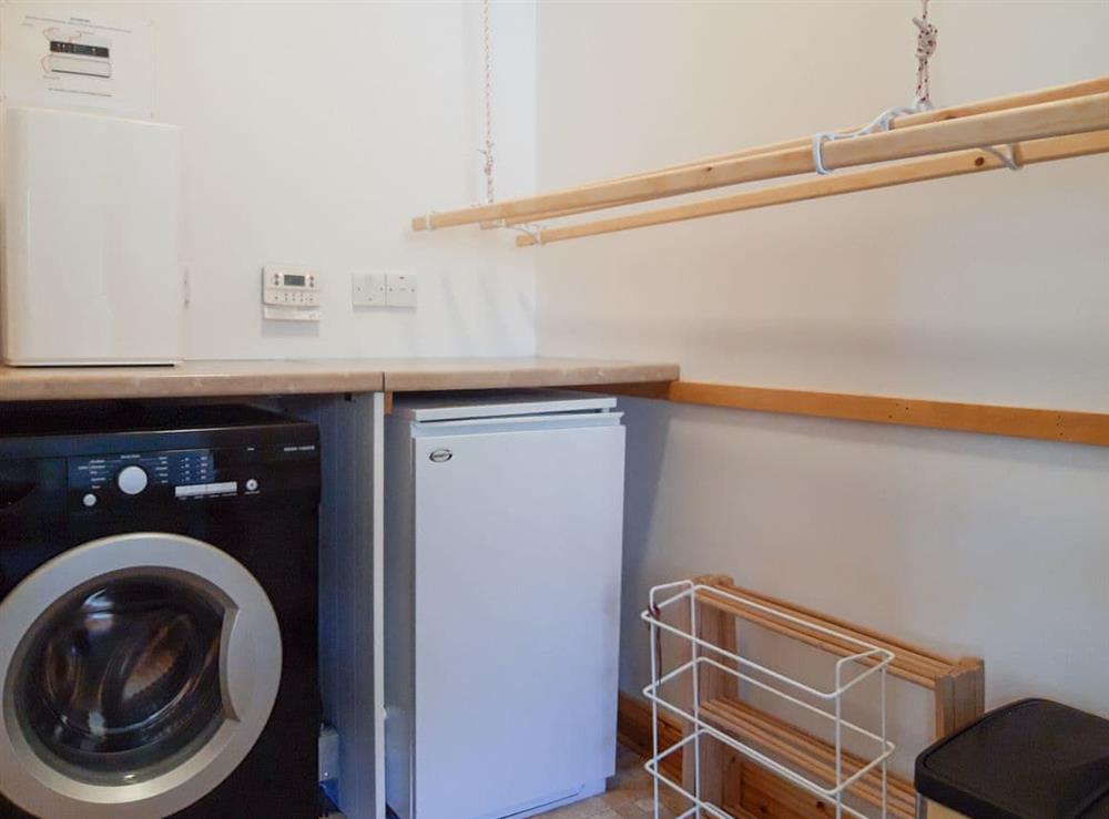 Useful utility room at Lismore Cottage in North Ballachulish, near Glencoe, Highlands, Inverness-Shire