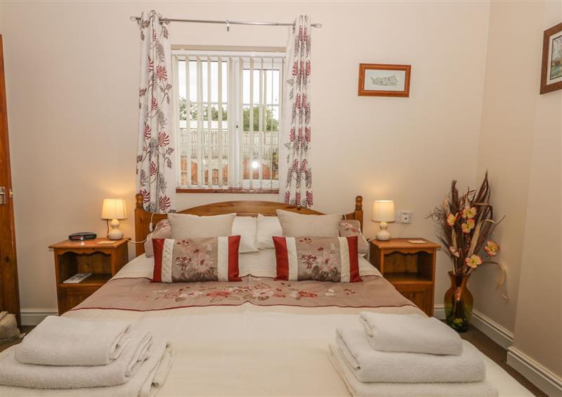 A bedroom in Little Argham Cottage (photo 2) at Little Argham Cottage, Filey