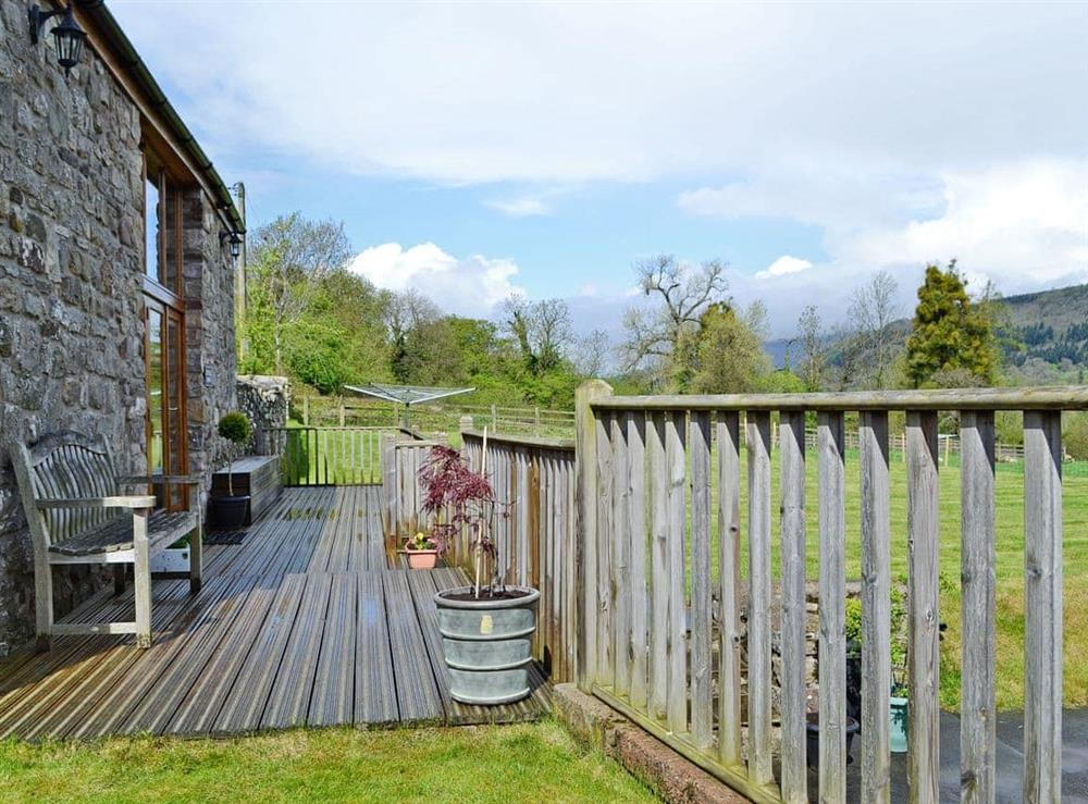 Relaxing decking area with wonderful views at Little Barn in Govilon, near Abergavenny, Monmouthshire, Gwent