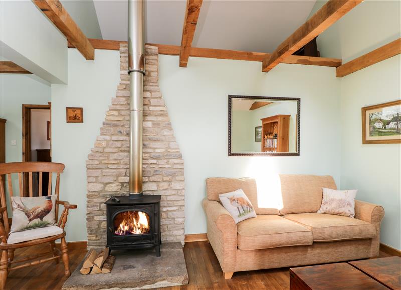 Relax in the living area at Little Barn, Yatton Keynell