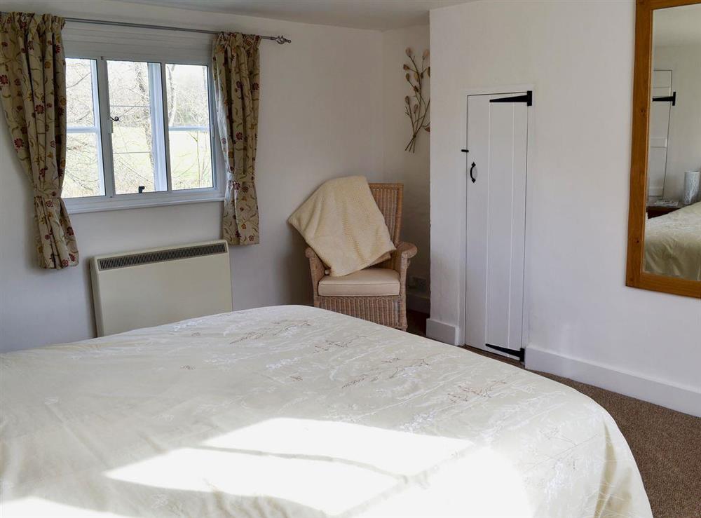 Well furnished comfortable double bedroom at Little Birketts Cottage in Holmbury St Mary, near Dorking, Surrey