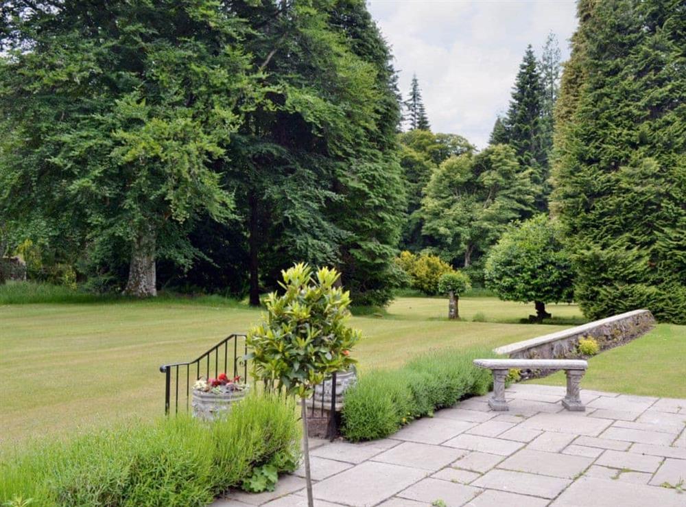 Patio overlooking gardens at Little Blackhall Lodge in near Banchory, Aberdeenshire