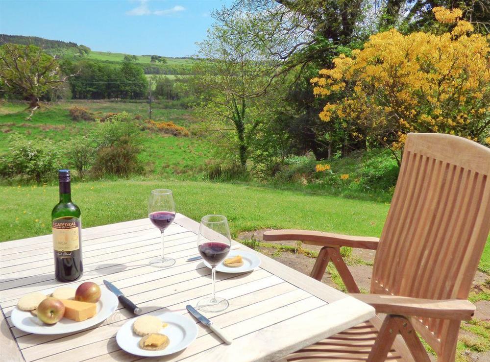 Sitting-out-area with wonderful countryside views at Little Boreland in Gatehouse of Fleet, Dumfries and Galloway