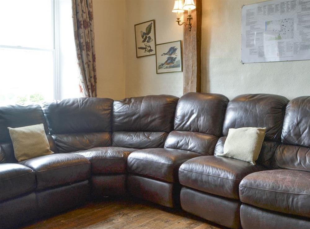 Comfy sofa within living room at Little Brampton in Bucknell, Shropshire