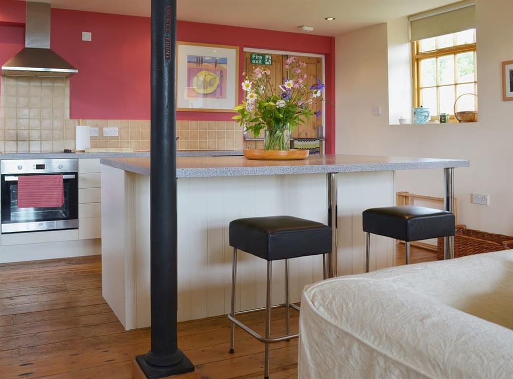 There is a comfortable breakfast bar at Little Burcott Loft in Wells, Somerset
