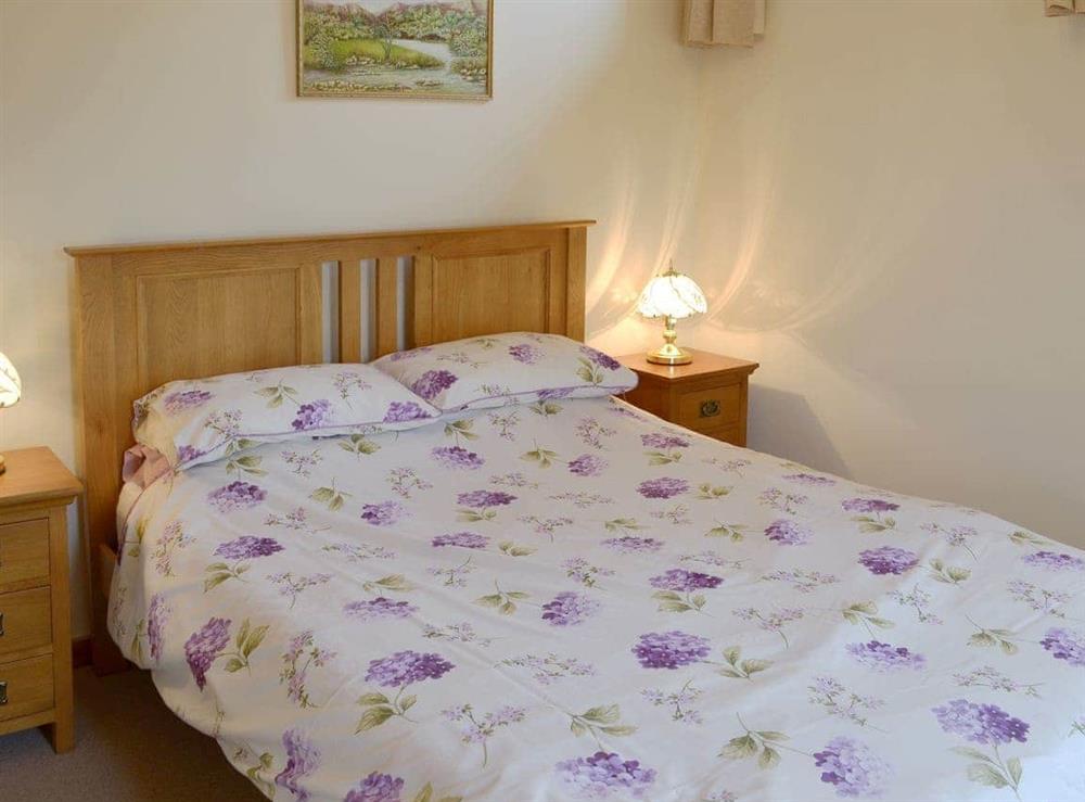Comfortable double bedroom with en-suite at Orchard View Barn, 