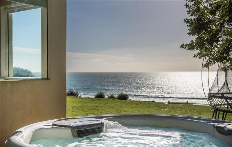 Enjoy the hot tub at Little Cottage and Love Shack, Cornwall