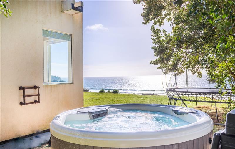 Spend some time in the hot tub at Little Cottage, Cornwall