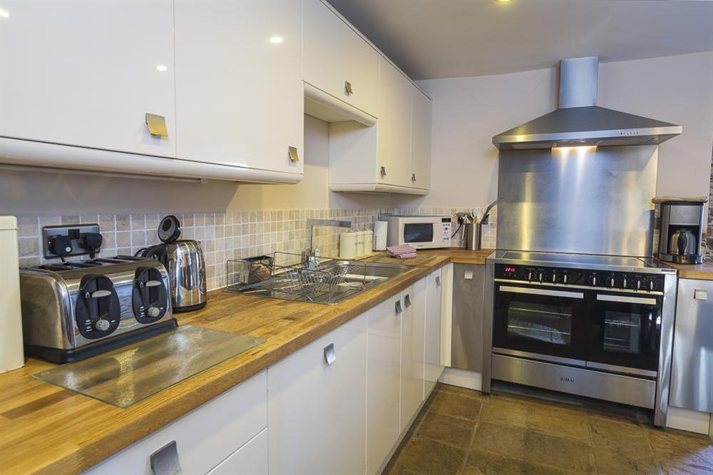Modern kitchen with a large Range cooker at Little Cotton Farmhouse in Venn Lane, Nr Dartmouth
