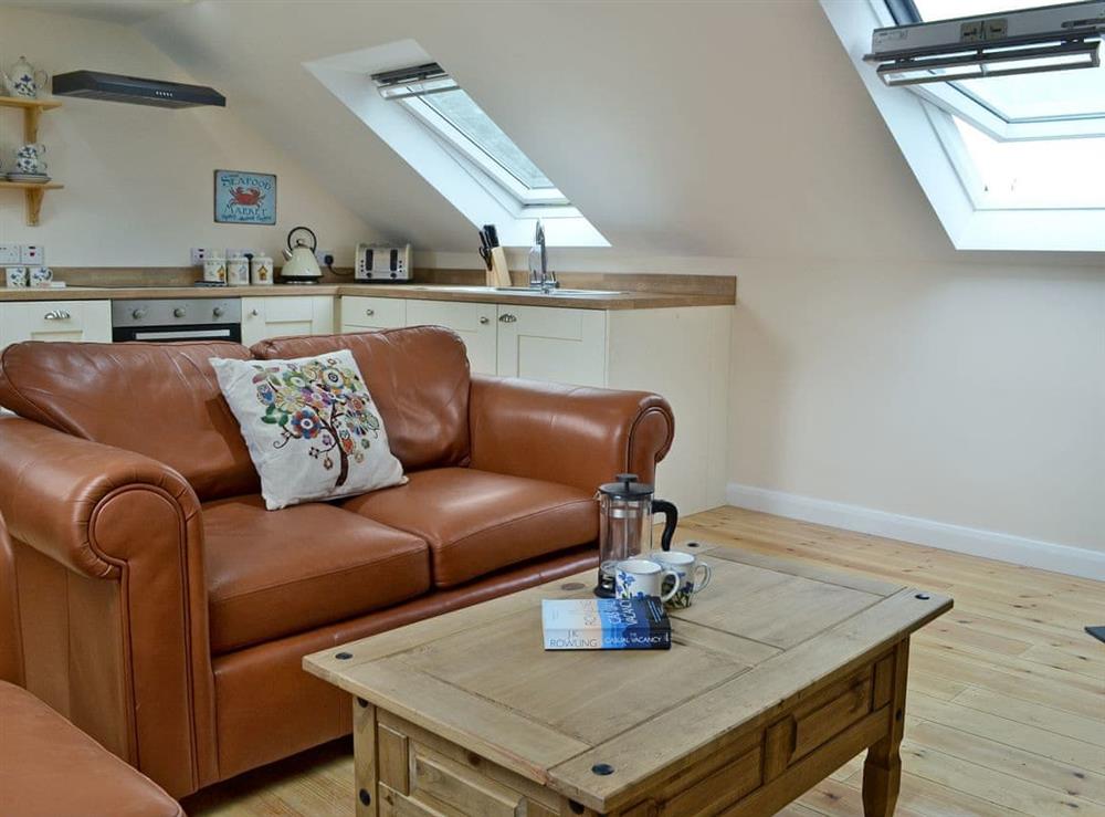 Beautifully presented open plan living space (photo 2) at Stonechat Barn, 