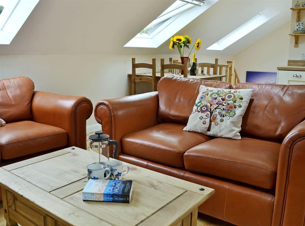 Beautifully presented open plan living space at Stonechat Barn, 
