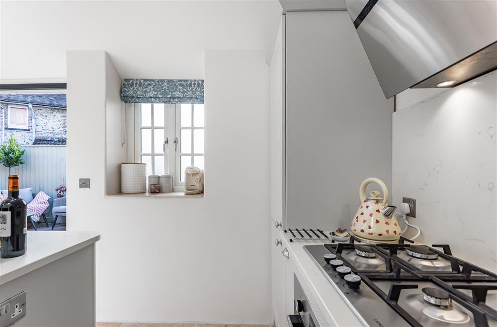 Little Dorset Cottage, Dorset: The kitchen with gas hob and electric oven at Little Dorset Cottage, Blandford