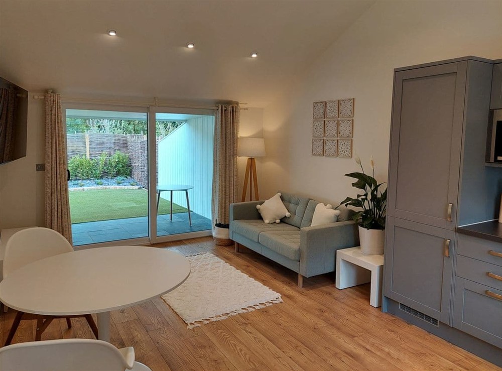 Open plan living space at Maple, 