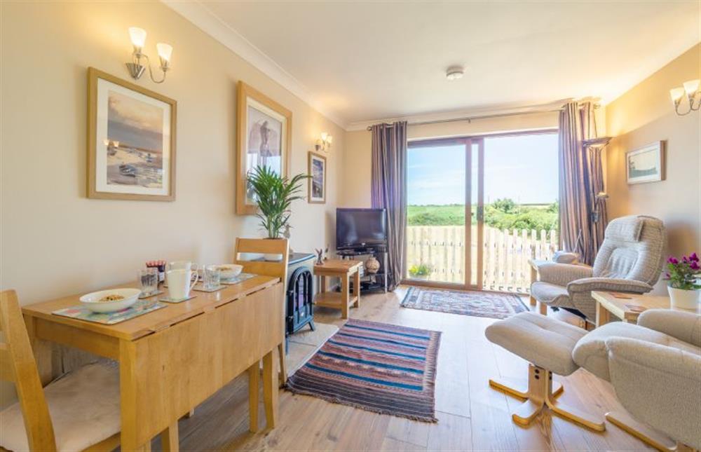 Ground Floor: Sitting room with a lovely view at Little Emmaus, Cley-next-the-Sea near Holt