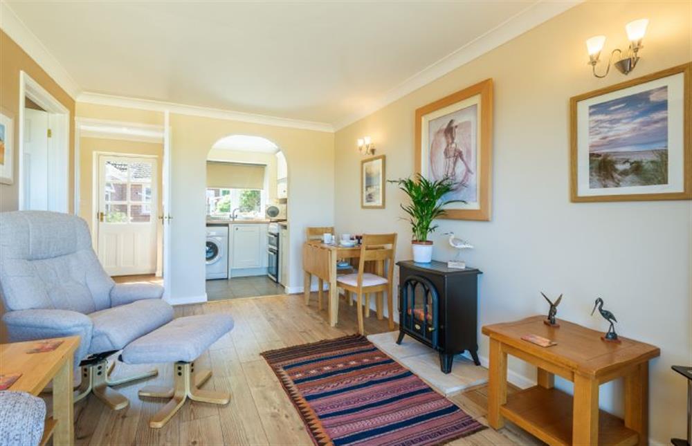 Ground floor: Sitting room with kitchen at the far end at Little Emmaus, Cley-next-the-Sea near Holt