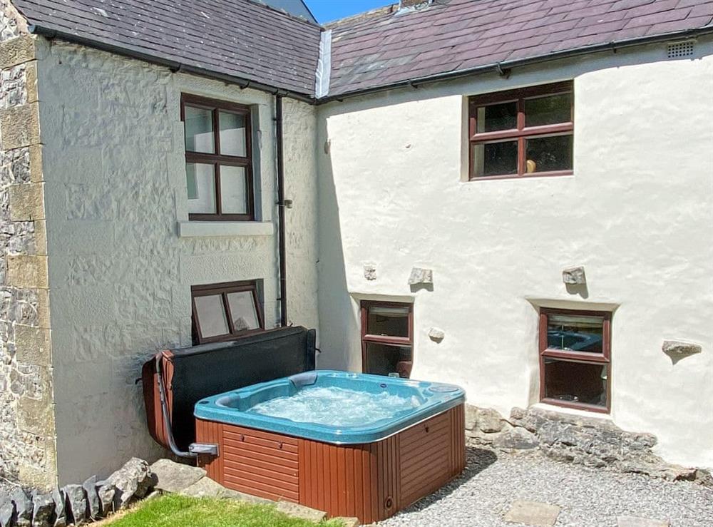 Relaxing hot tub at Little Foxlow Cottage in Buxton, Derbyshire
