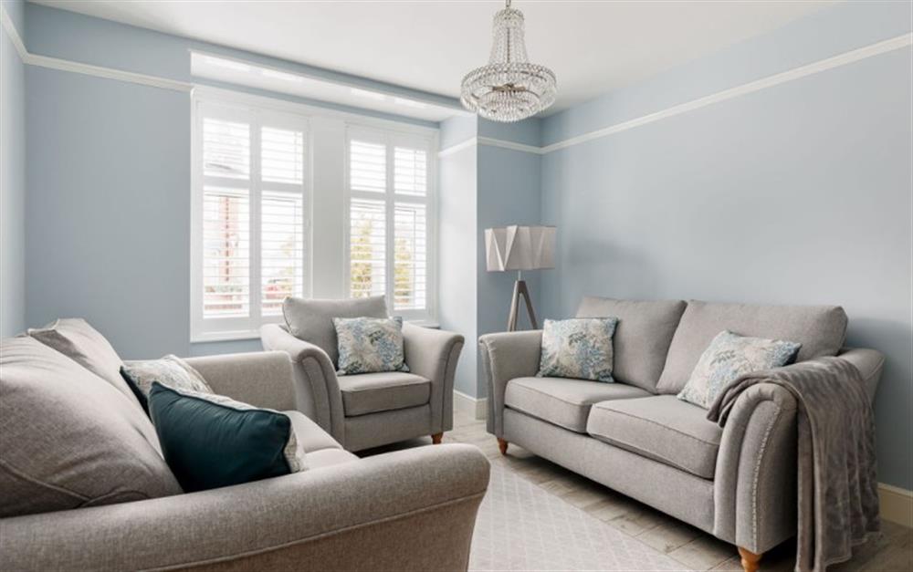 Relax in the living area at Little Gem Cottage in Lymington