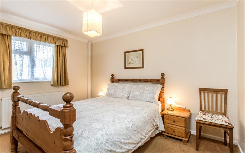 Bedroom 1 with double bed at Little Haven in Colyton
