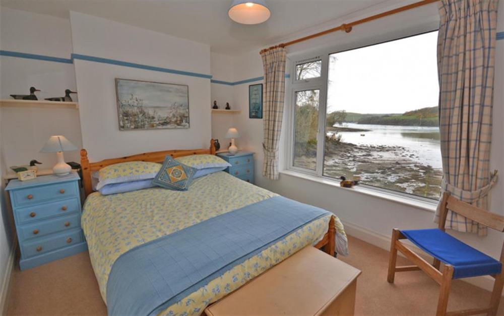 The master bedroom overlooking the water. at Little Haven in East Portlemouth