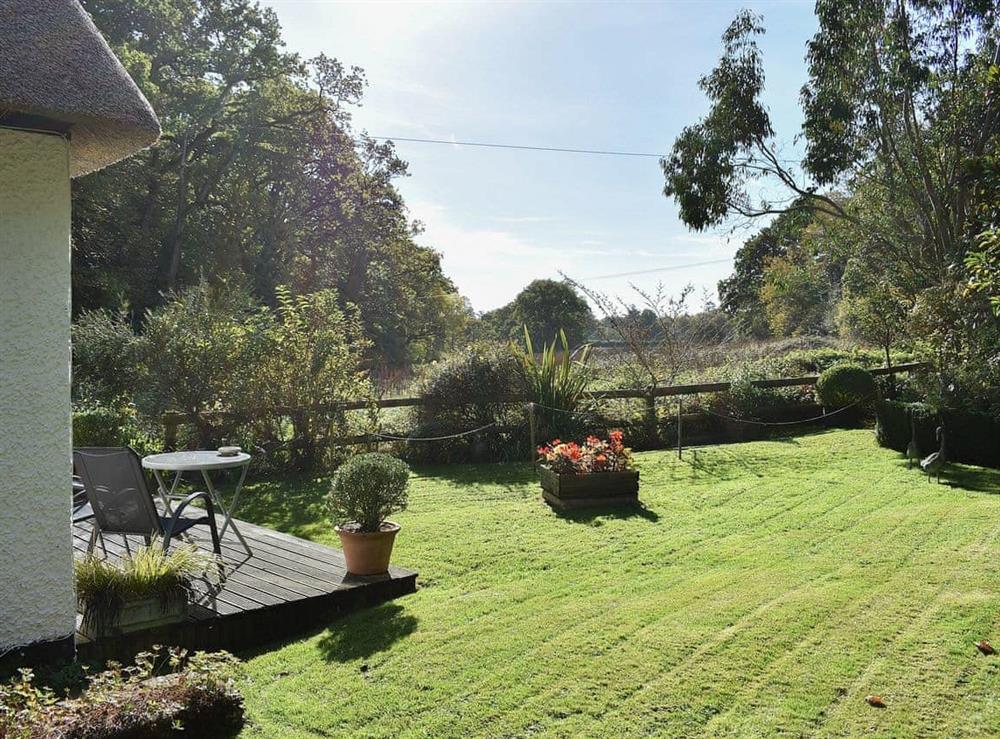 Lawned garden with charming rural views at Little Heathfield in Bransgore, Nr Christchurch., Dorset