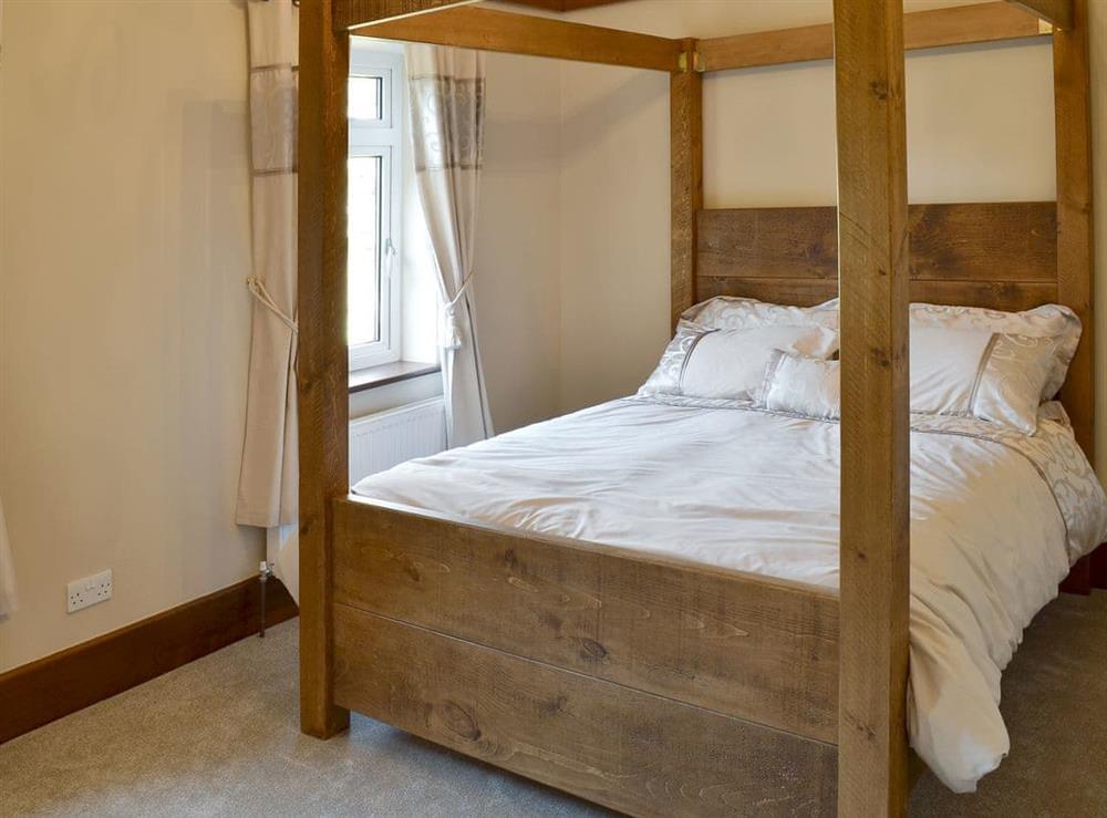 Great four poster bedroom at Little Hoot in Baslow, near Bakewell, Derbyshire, England