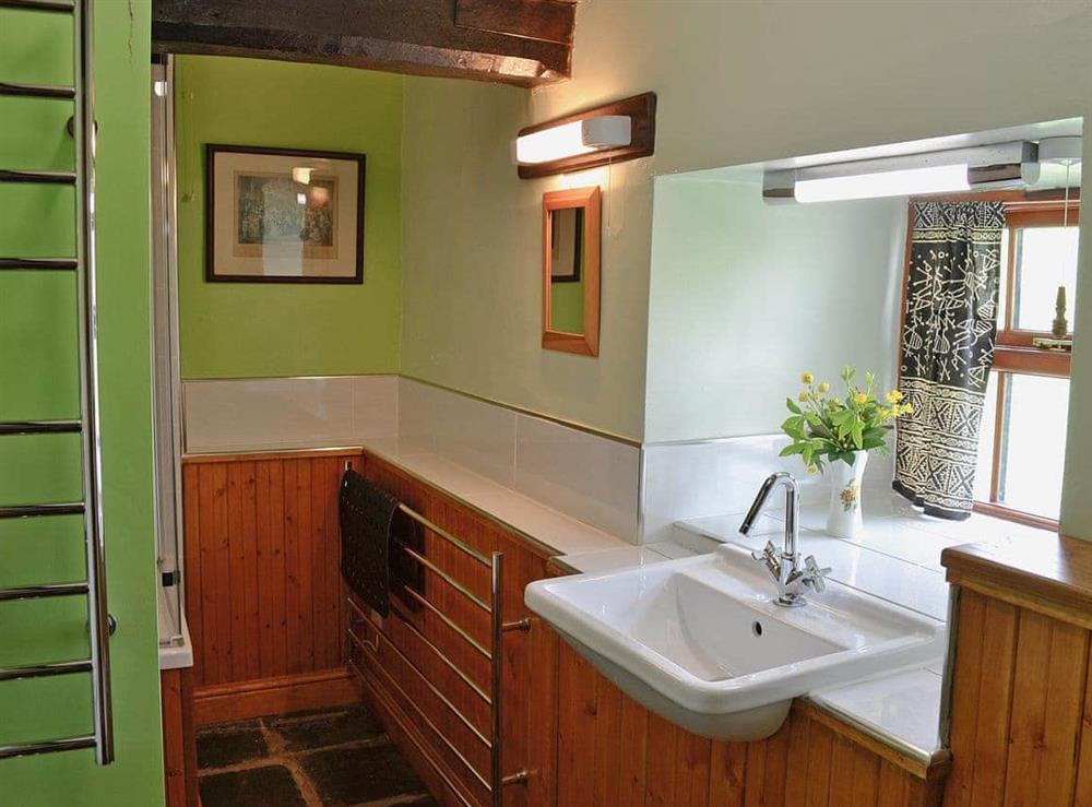 Half-panelled bathroom with flag flooring at Little Knott in Blawith, near Coniston, Cumbria