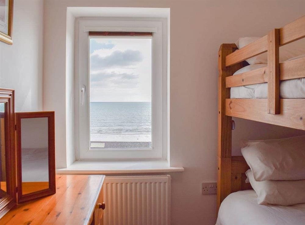 Gaze at the sea from the bunk bedroom at Little Lismoy in Sandown, Isle of Wight