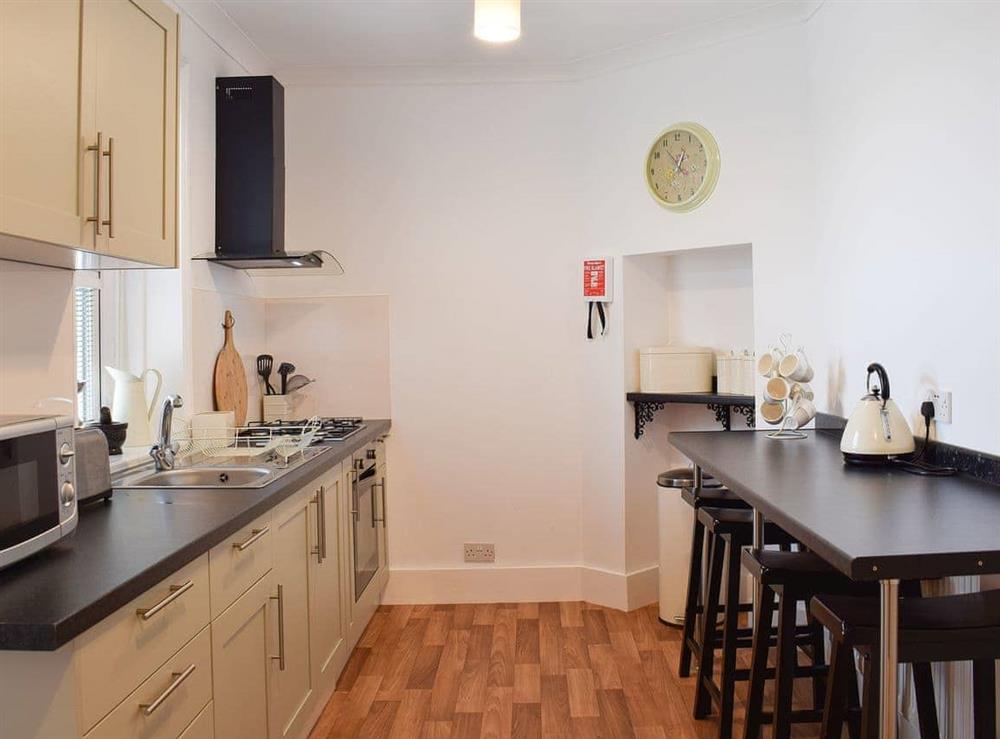 Well appointed kitchen with breakfast bar at Little Lismoy in Sandown, Isle of Wight
